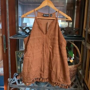 Dressy, sleeveless, open neck top